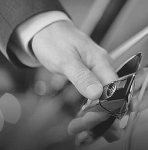 Hand opening car door to get car